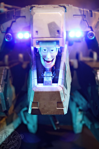 Illustration for article titled Creepy Woody Trolling the World's Coolest Figures and Toys